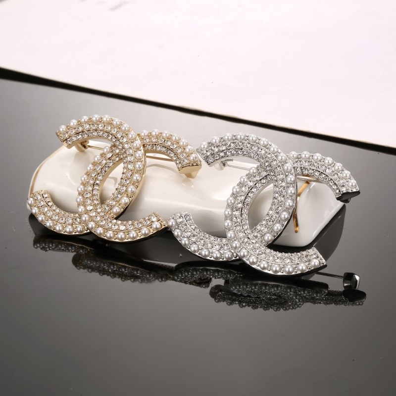 Ch**el brooches